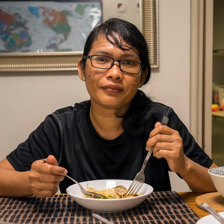 Indonesian domestic worker from Central Java working in Singapore,