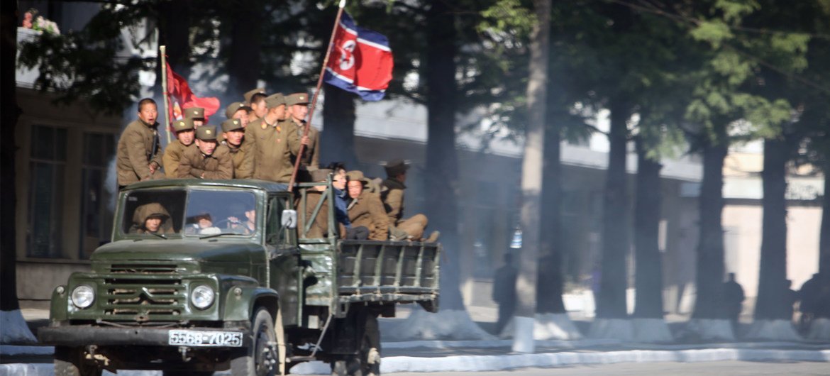  Street scene in Pyongyang, DPRK where a truck can be seen moving military officials. 