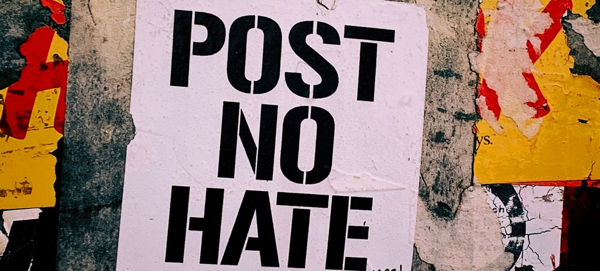 A poster saying "Post no hate" slogan