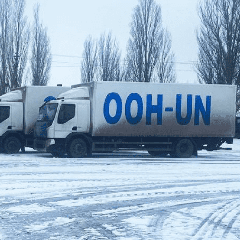 A convoy delivers aid to Dobropillia village in Ukraine's Zaporizhzhia region