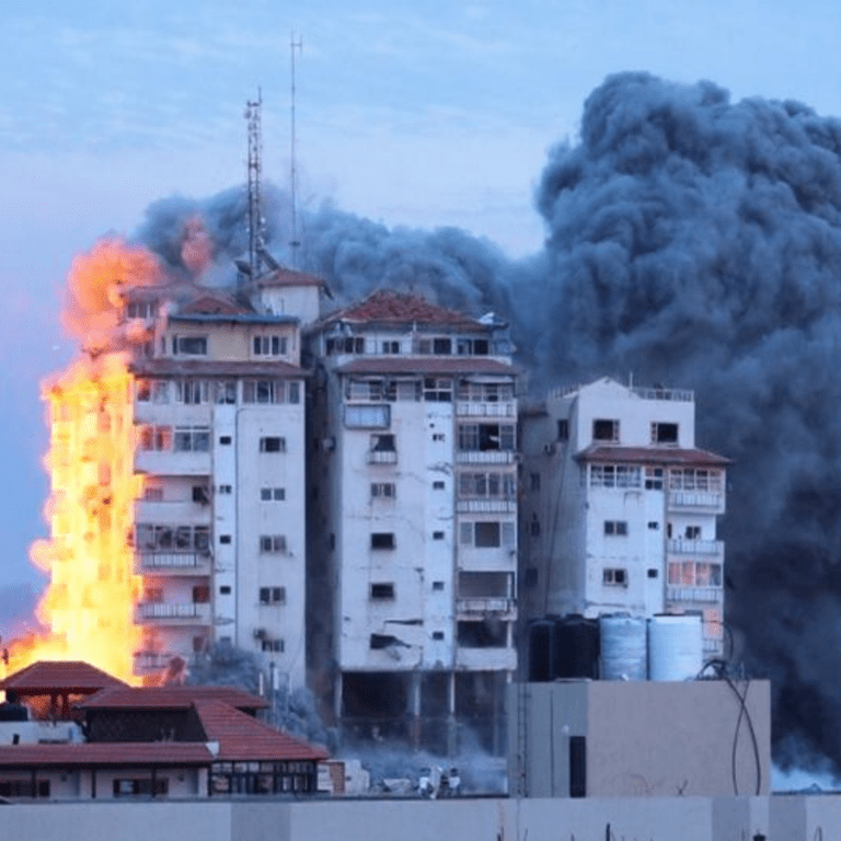 A building is engulfed in flames in central Gaza.