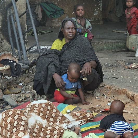 Displaced women and children at an Internally Displaced People's area in West Darfur due to the fighting in Sudan.