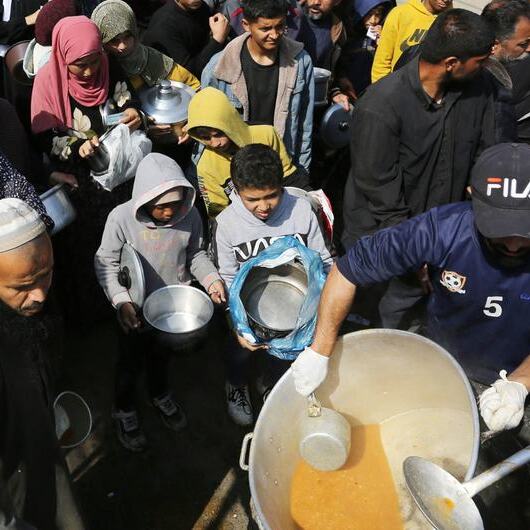 People queuing for food in Gaza